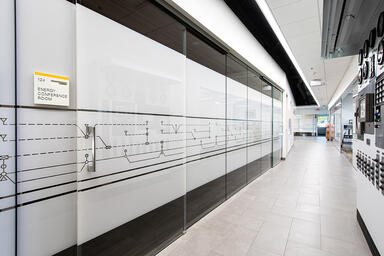 Partition wall and door in ViviGraphix Graphica glass in View configuration