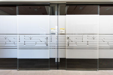 Partition wall and doors in ViviGraphix Graphica glass in View configuration