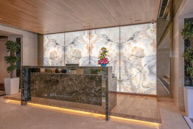LightPlane Panels in ViviStone Opal Onyx glass with Pearlex+ finish at Puravankar