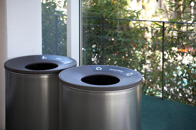 Universal Litter &amp; Recycling Receptacles shown in 36 gallon, top opening