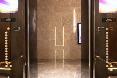 Elevator return panels in Black Mirror glass at Radisson Blu Hotel & Spa, Nashik