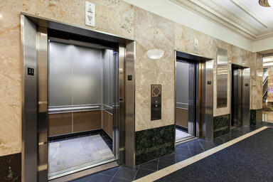 LEVELe-105C Elevator Interior; Capture panels in ViviChrome Chromis glass 