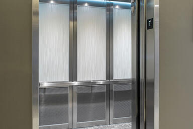 LEVELc-2000 Elevator Interior with upper panels in ViviGraphix Graphica glass wi