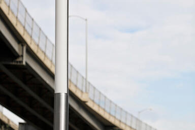 Light Column Pedestrian Lighting shown with 180-degree perforated shield