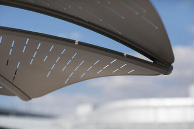 Detail of Soleris Sunshade aluminum panels shown with Slat perforation pattern