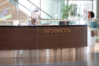 Information desk panels in Bonded Metal in custom color with Dark Patina