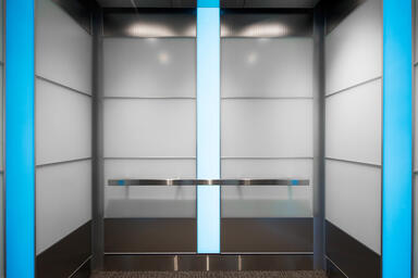 LEVELe-107A Elevator Interior; Capture panels in ViviChrome Chromis glass 