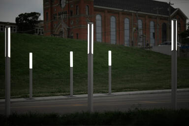 Trio Pedestrian Lighting shown with Aluminum Texture powdercoat