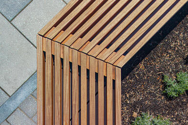 Hudson Benches shown with FSC&reg; 100% hardwood slats and custom mounting