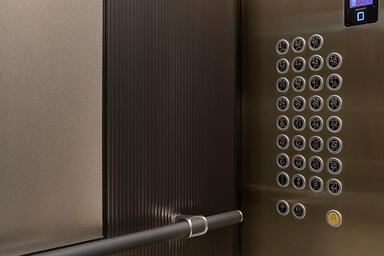 LEVELe-105 Elevator Interior with customized panel layout; Capture panels