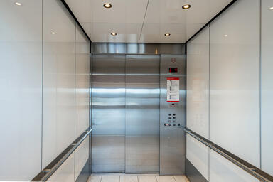 LEVELe-105 Elevator Interior with customized panel layout; Capture panels