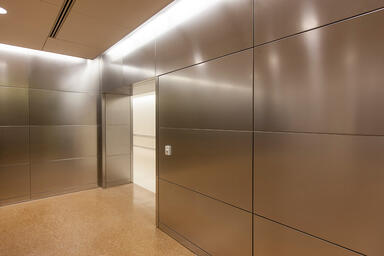 LEVELe Wall Cladding System with Float panels in Stainless Steel with Linen