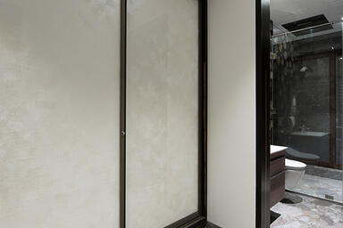 Wardrobe shutters in ViviGraphix Graphica glass shown in Reflect configuration w