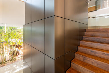 LEVELe Wall Cladding System with Float panels in Fused Nickel Silver