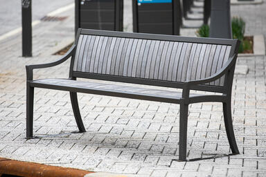 Cordia Bench in 6-foot backed configuration with Slate Texture powdercoat