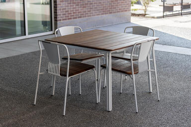 Factor Table &amp; Chairs: White Texture powdercoat, FSC&reg; 100% Cumaru.