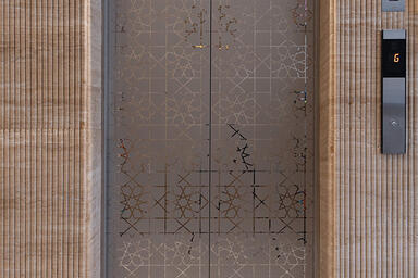 Stainless Steel Elevator Doors in Mirror finish with custom Eco-Etch pattern