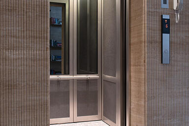 LEVELc-2000 Elevator Interior with upper panels in Grey Mirror Glass and Fused