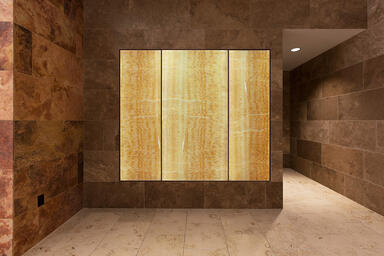 LightPlane Panels in ViviStone Honey Onyx with Pearlex+ finish shown illuminated 