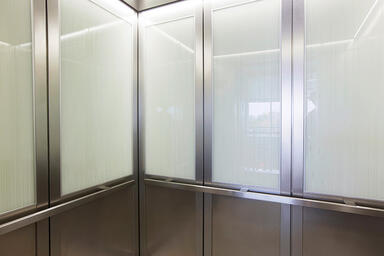 LEVELc-2000 Elevator Interiors with panels in ViviGraphix Graphica glass
