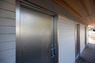 Stainless Steel doors with Sandstone finish and custom Eco-Etch pattern