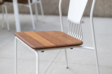 Factor Chair without arms shown with FSC 100% Cumaru hardwood slat seat