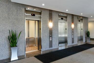 LEVELc-2000 Elevator Interior with upper panels in ViviGraphix Graphica glass wi