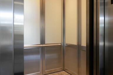 LEVELc-2000 Elevator Interior with upper panels in ViviGraphix Graphica glass