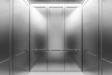 LEVELc-2000 Elevator Interior with inset panels in Stainless Steel with Satin fi