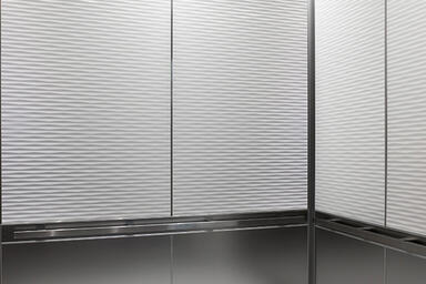 LEVELe-106 Elevator Interior with main panels in Bonded Quartz, White 