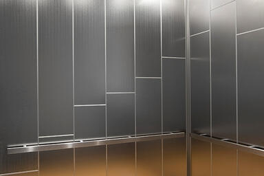 LEVELe-108 Elevator Interior shown with upper panels in Stainless Steel 