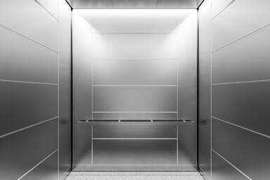 LEVELe-102 Elevator Interior; Capture panels in Stainless Steel with Seastone
