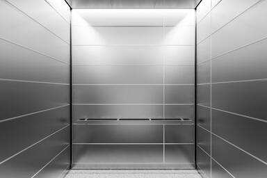 LEVELe-103A Elevator Interior; Capture panels in Stainless Steel with Seastone f