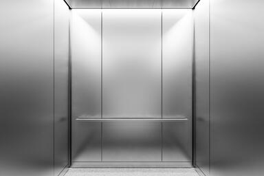 LEVELr-202A Elevator Interior; panels in Stainless Steel with Seastone finish
