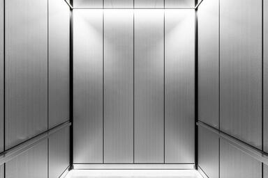 LEVELr-203C Elevator Interior; panels in Stainless Steel with Seastone finish
