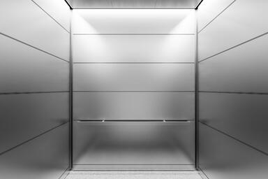 LEVELr-204A Elevator Interior; panels in Stainless Steel with Seastone finish