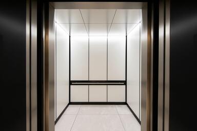 LEVELe-105A Elevator Interior; Capture panels in ViviChrome Chromis glass with W
